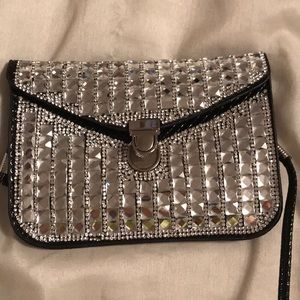 Black & silver handheld or over the shoulder